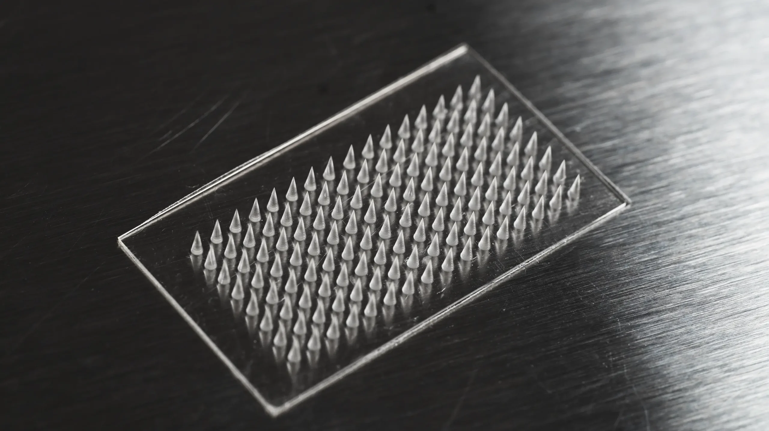 High-resolution 3D-printed microneedle for microfluidics